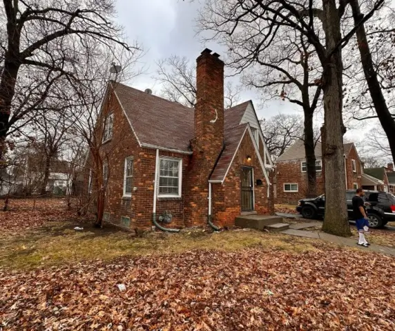 Undated photo of a house needing repairs, situated in Center Line, MI